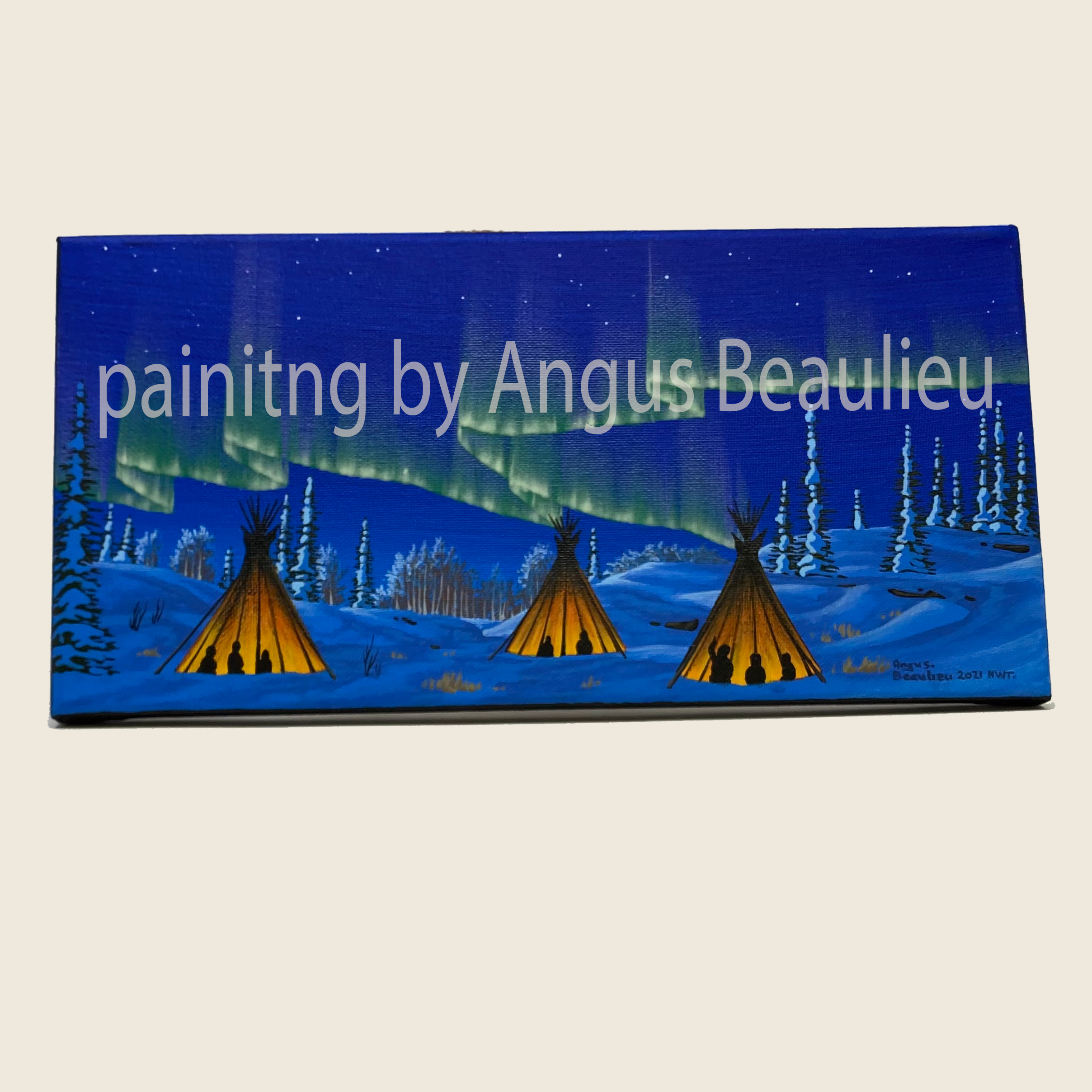 Three tipi with northern lights